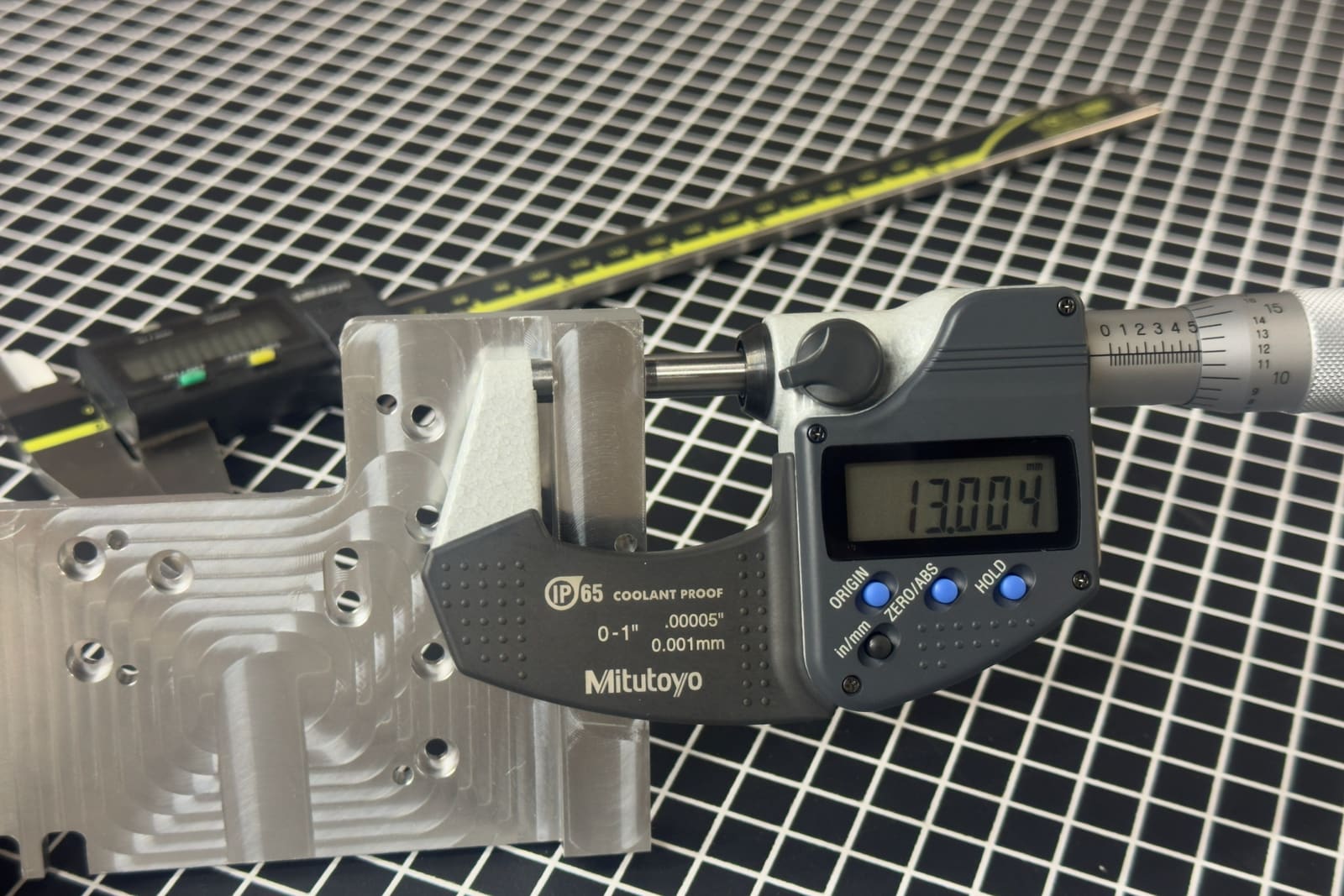 Micrometer inspection of a machined aluminum part